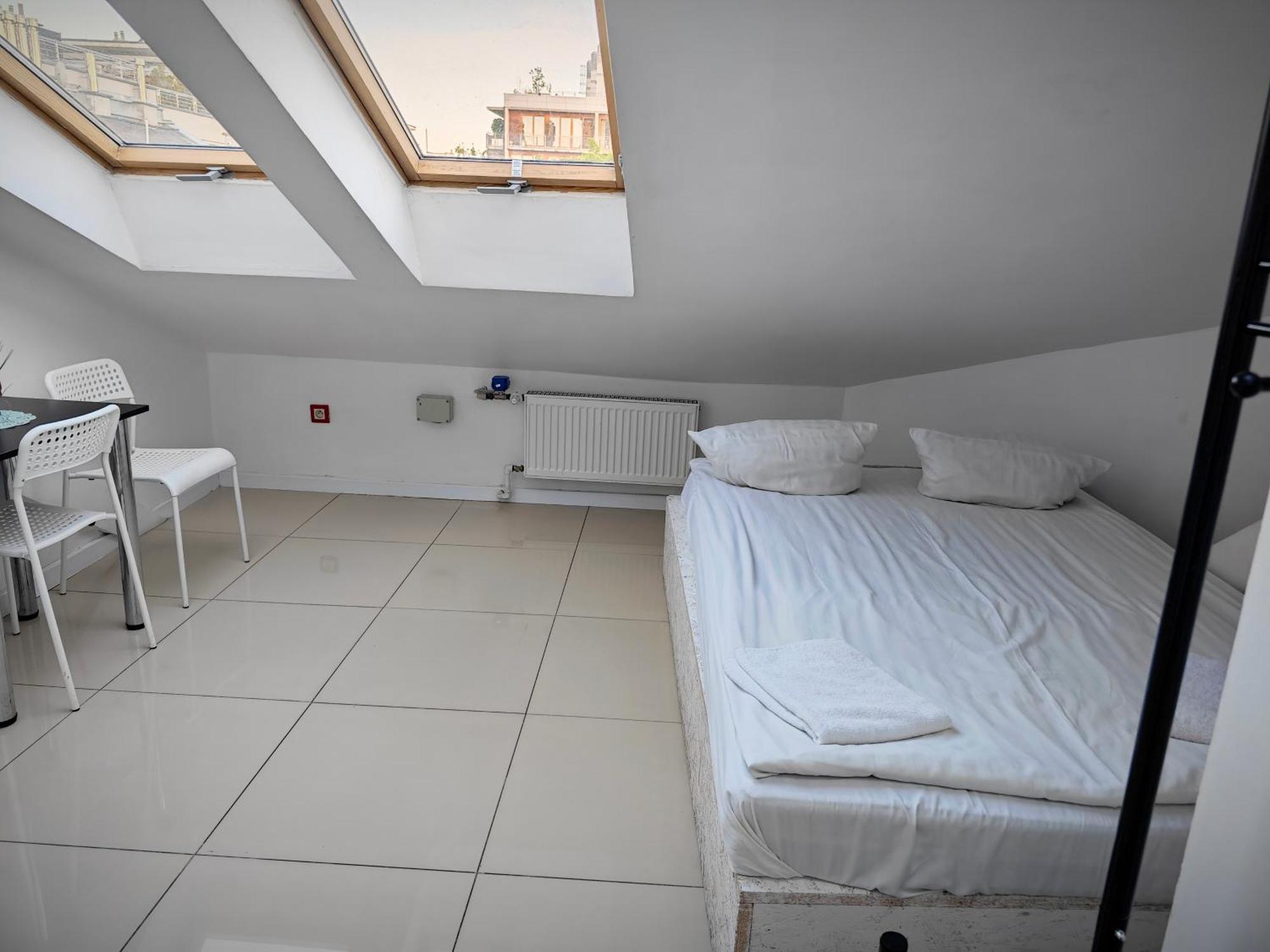 Apartamenty Hoza Attic Studio Warszawa Rum bild