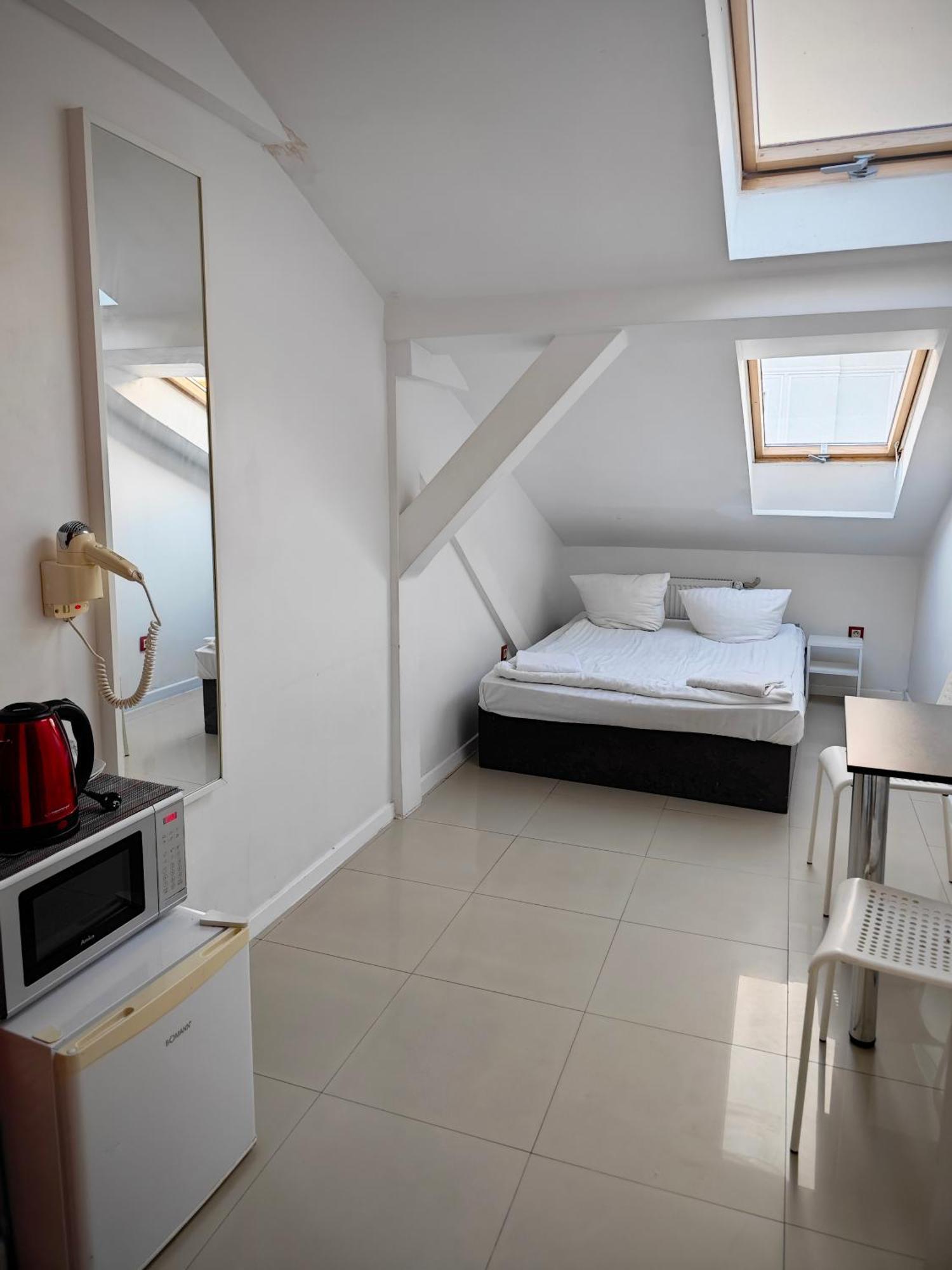 Apartamenty Hoza Attic Studio Warszawa Rum bild