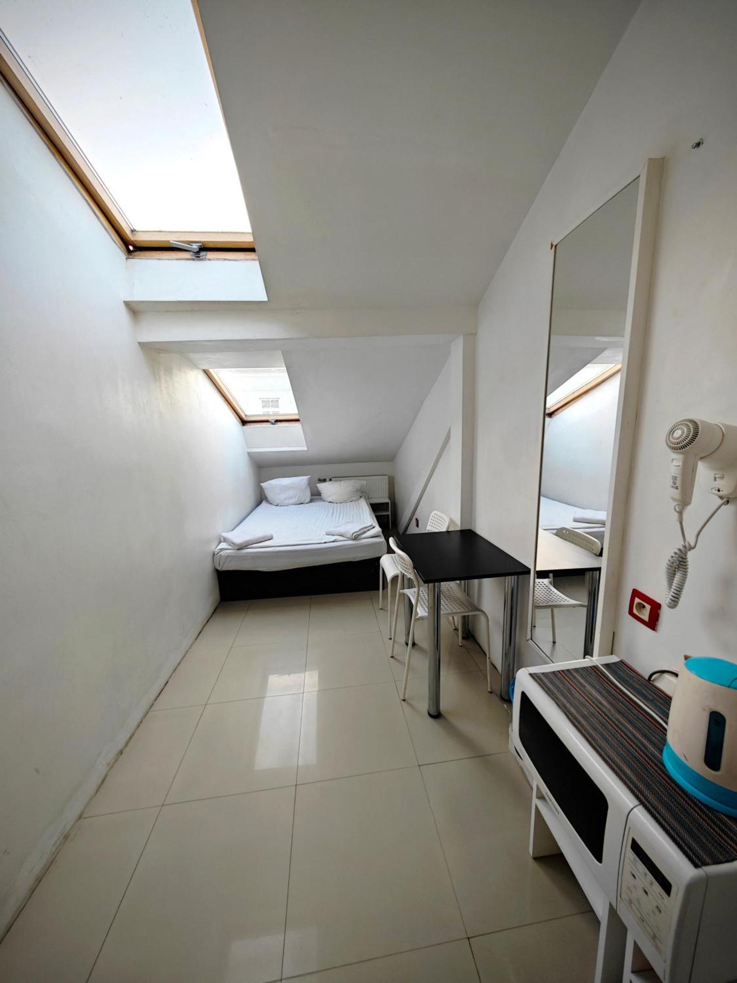 Apartamenty Hoza Attic Studio Warszawa Rum bild