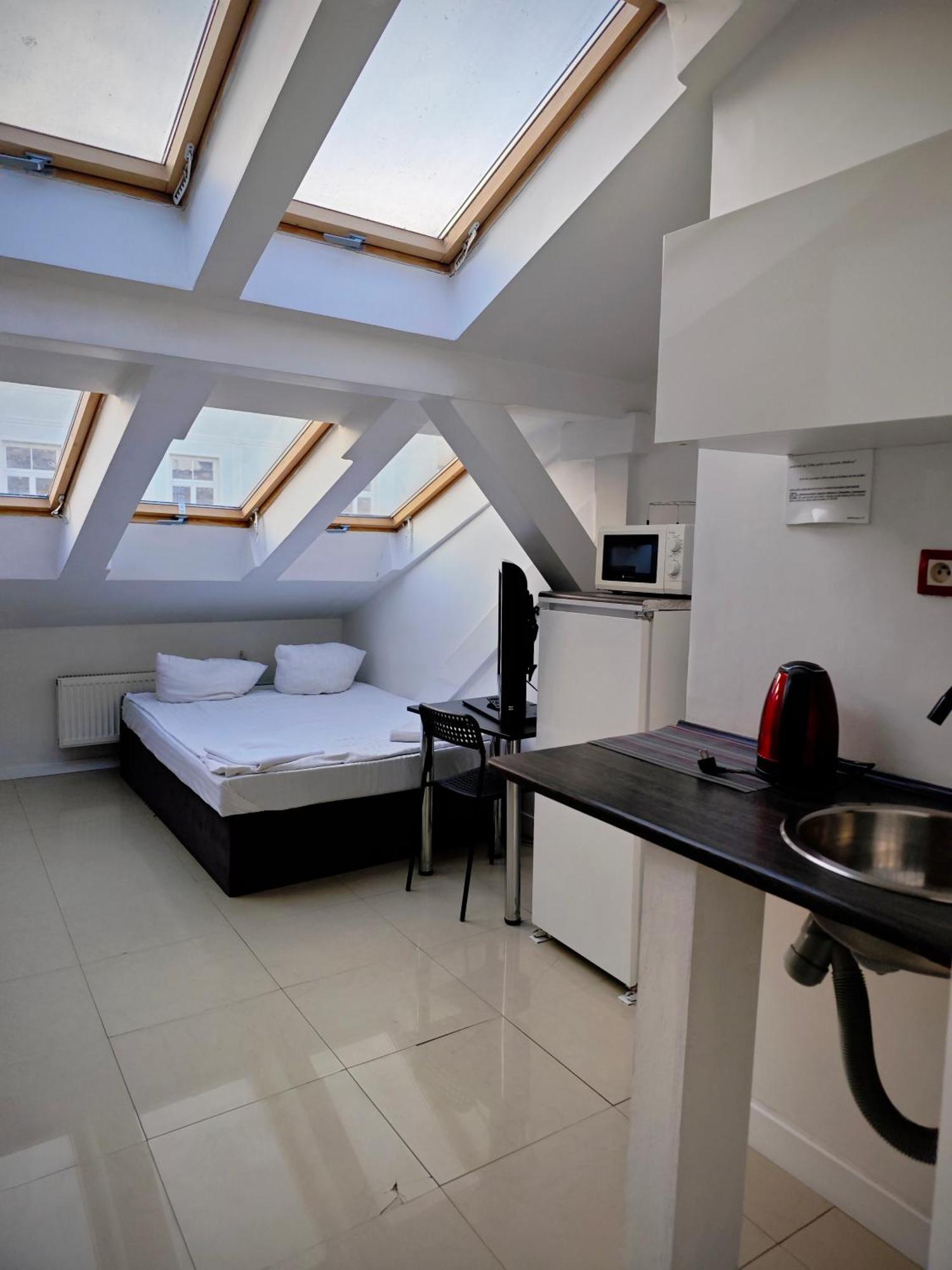 Apartamenty Hoza Attic Studio Warszawa Rum bild